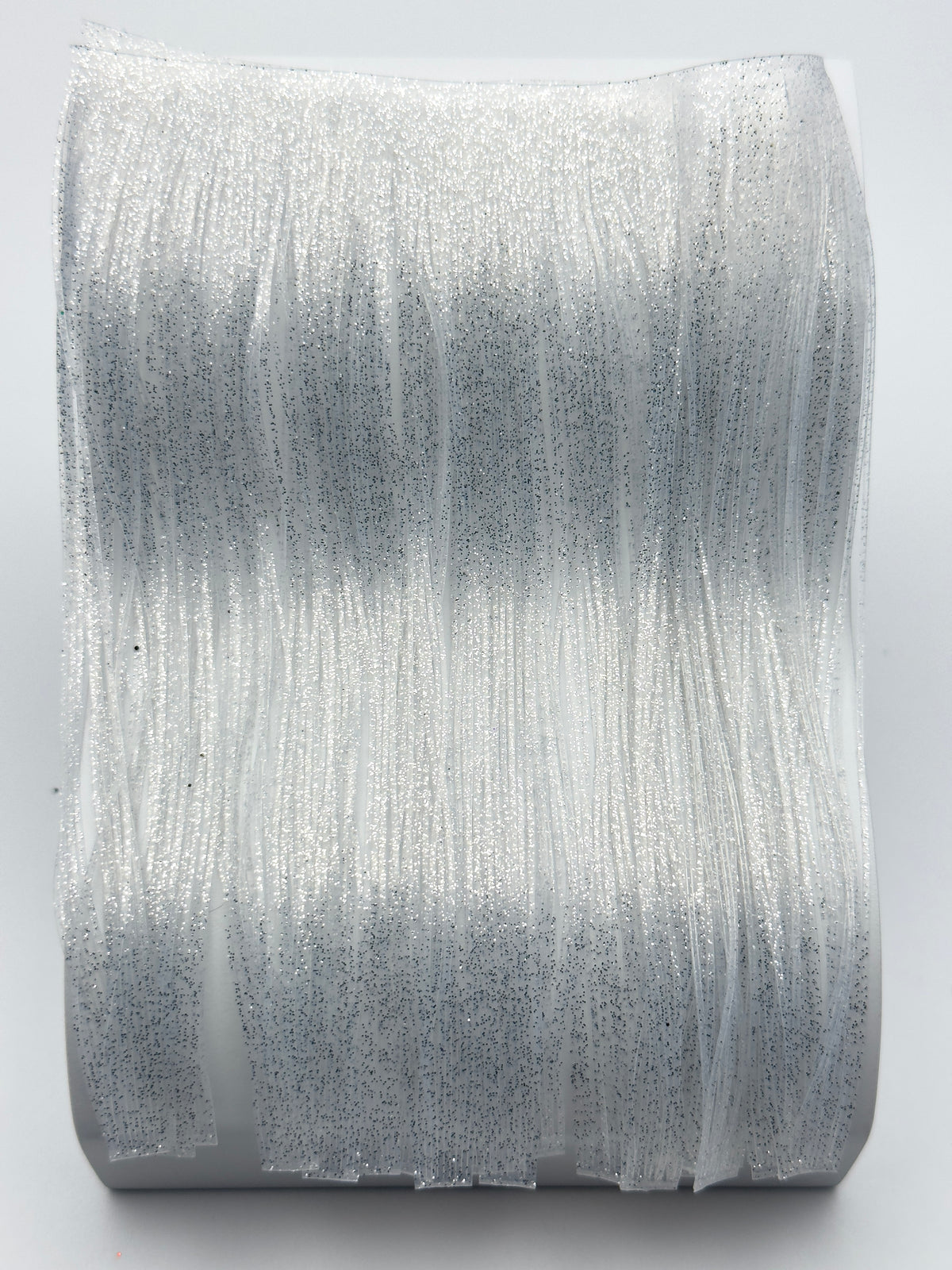 8801-048 – Standard Silicone Skirt Material – Clear/Silver Flake