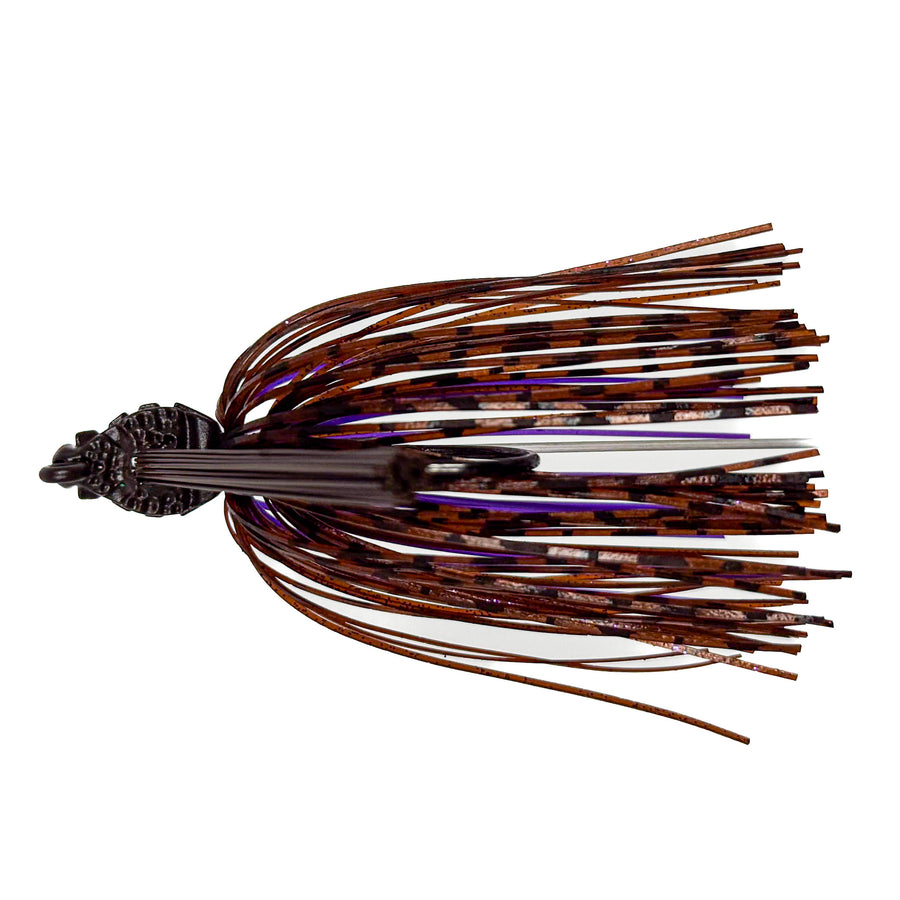 Fishing lure with brown and purple color pattern on a white background