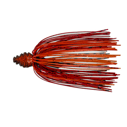 Fishing lure with red and black skirt on a white background